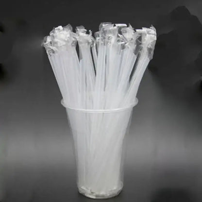 A clear plastic cup filled with decorbites clear individually wrapped drinking straws in transparent packaging