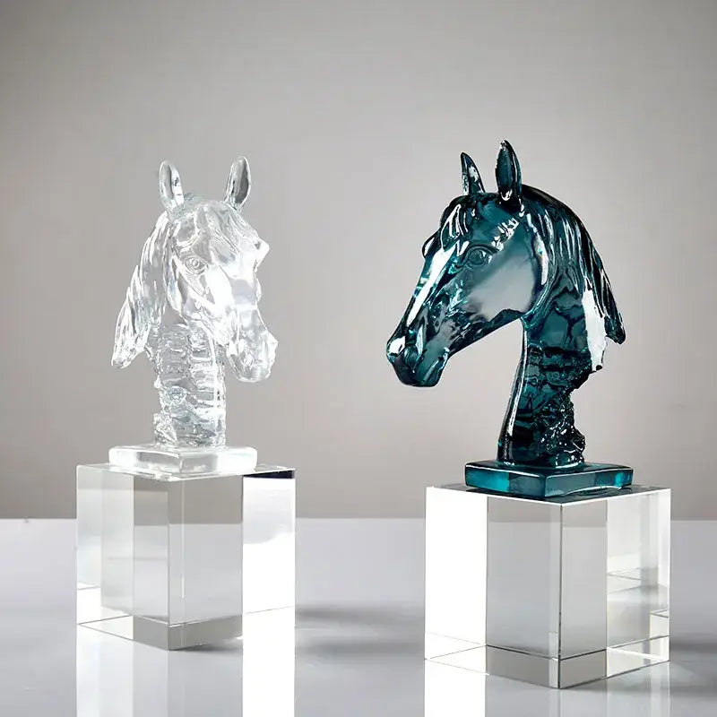 Two glass horse head crystal statues in clear and teal blue mounted on transparent pedestals for living room decorbites horse head decor