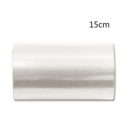 A sleek 15cm long clear transparent plastic cake edge wrap for decorbites cake mousse decorating tool