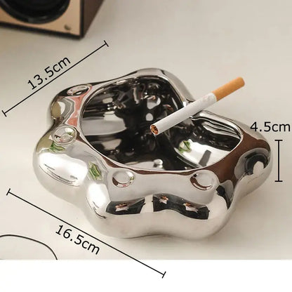 Shiny silver metallic cat paw porcelain ashtray with smooth cloud-like shape and rounded edges for decorbites cat paw gift