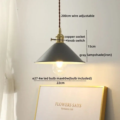 Industrial-style pendant light with matte gray iron shade brass-finished socket and adjustable cord for dining room decorbites ceramic led