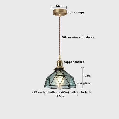Blue glass pendant light with copper socket and iron canopy complements decorbites ceramic led pendant for dining room