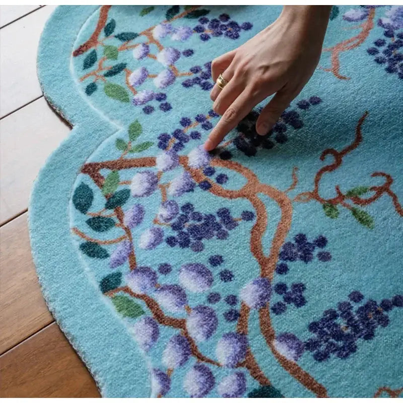 Cloud shaped teal and purple wisteria door mat featuring a soft light blue decorbites grape vine woven design bedroom rug