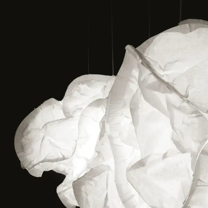 A sculptural cloud white pendant light with soft organic folds made of rice paper for kitchen decorbites cloud white
