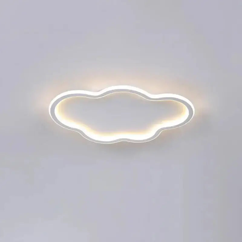 A decorbites cloudy white kids ceiling lamp with a minimalist cloud shape, white frame, and warm ambient glow