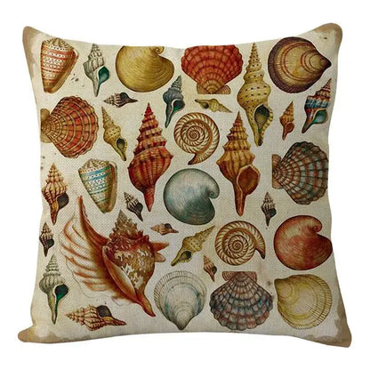 Beige coastal cushion cover with vintage seashell print in rust olive green and muted blue from decorbites coastal set