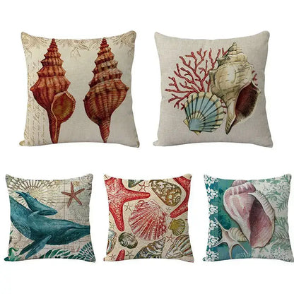 Set of four square decorbites coastal cushion covers with vintage sea life prints on textured neutral fabric