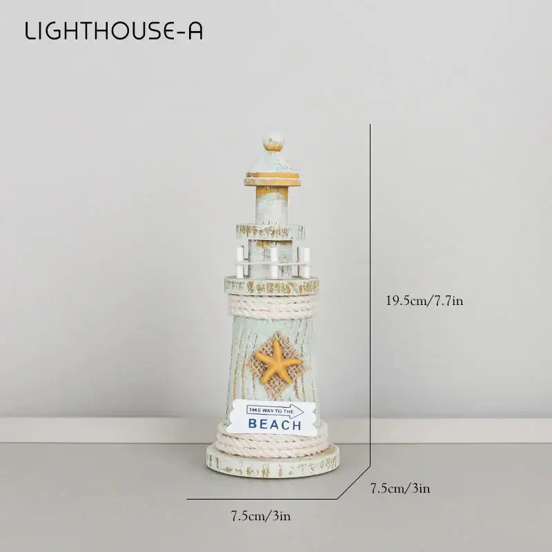 Coastal white and gray wooden ship model decor featuring a distressed coastal wooden lighthouse with starfish and beach sign