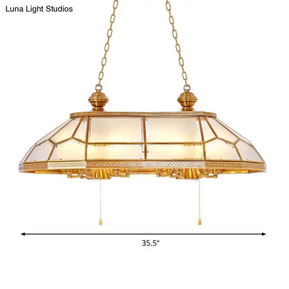 Gold-toned pendant table lamp with opal blown glass geometric stained-glass shade for living room decor