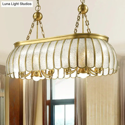 DecorBites gold colonial style pendant ceiling light with bubble glass and scallop accented textured panels for kitchen