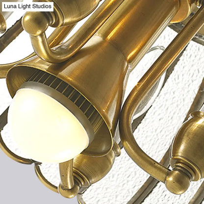 Brass-finished decorbites™ colonial style pendant ceiling light with bubble glass bulbs and scallop accented arms