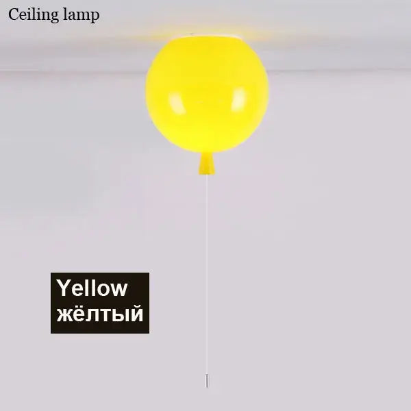 A bright yellow decorbites colorful balloon ceiling light with a glossy finish and white cord for bedroom and dining room decor