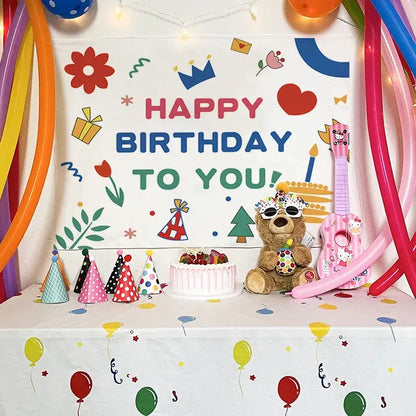 A colorful cartoon animal birthday wall tapestry features a plush brown teddy bear with sunglasses and party hat