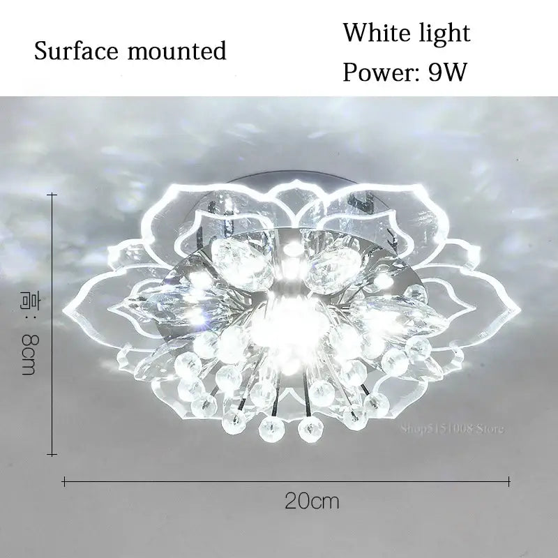 Delicate white crystal ceiling light fixture with floral design clear glass elements and led lighting for living room