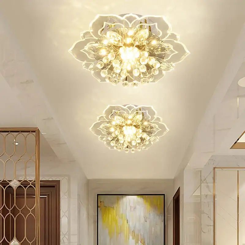 Two elegant colorful crystal flower ceiling light fixtures with a floral design illuminate the living room ceiling