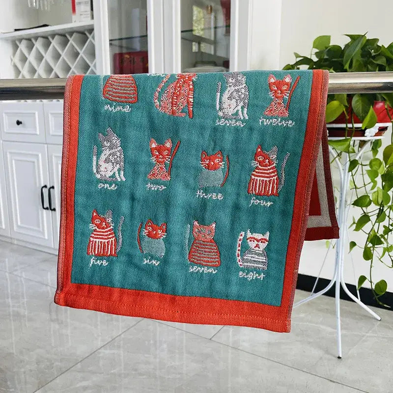 Teal and orange embroidered cat gauze hand towel with numbered red white and gray cats grid for decorbites cat gauze set