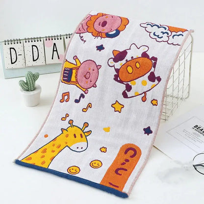 White cotton cat gauze hand towel with colorful dinosaur animal prints and blue border from decorbites set of 4 hand towels