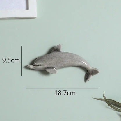 Gray ceramic dolphin fish ocean wall decoration with smooth glossy finish and subtle shading for children’s room decorbites dolphin fish