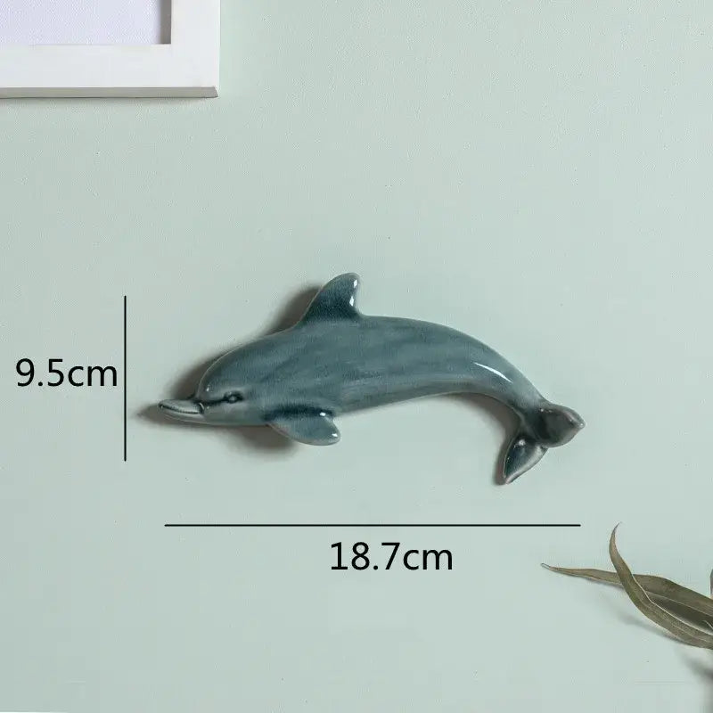 A sleek gray glazed ceramic wall decoration dolphin fish ocean decorbites for children’s room decor