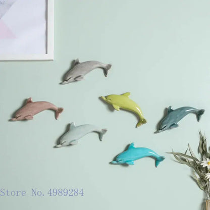 Set of six colorful pastel ceramic dolphin fish ocean wall decoration decorbites dolphin fish for children’s room
