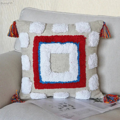 Beige pillow covers with colorful boho tassel macrame featuring textured layered square design and pom-poms decorbites boho tassel