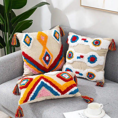 Vibrant decorbites geometric hand-embroidered tassel pillowcase with colorful geometric patterns on neutral fabric