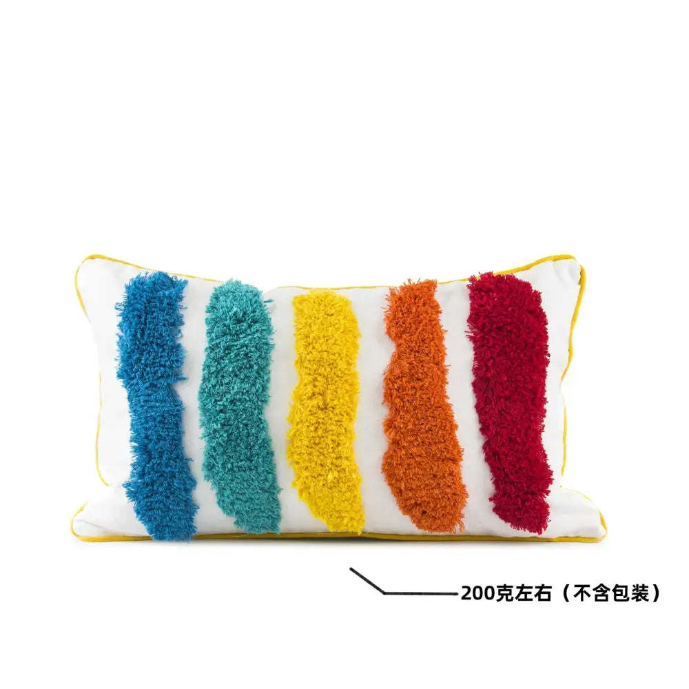 Rectangular white decorbites geometric hand-embroidered tassel pillowcase with five vertical rainbow stripes and yellow trim