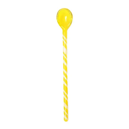 A translucent yellow colorful glass stirring spoon with candy stripes and spiral pattern for kitchen and dining decorbites colorful glass