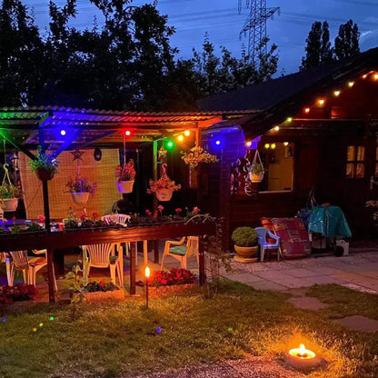 A cozy outdoor patio lit by decorbites colorful led shatterproof globe string light 10 pack and a warm candle