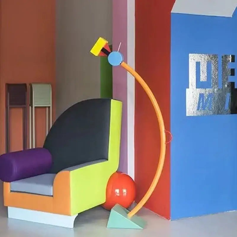 Vibrant geometric armchair with black backrest purple cushion lime green frame and orange legs in decorbites kids treetop led floor lamp set