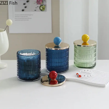 Set of three colorful ribbed glass tea canisters with gold-toned lids and round colored knobs storage jar decorbites glass tea