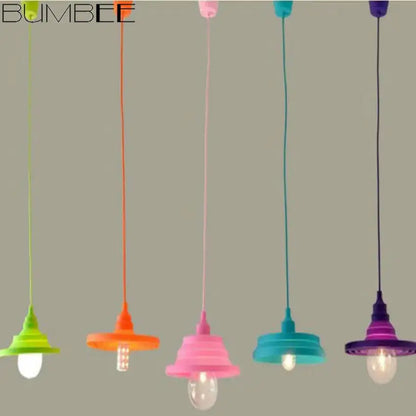 Five colorful silicone pendant lights with vibrant shades and exposed bulbs for modern living room decorbites colorful silicone decor