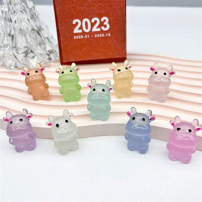 A collection of colorful translucent resin micro rabbit figurines in pastel shades for bedroom decor ornaments