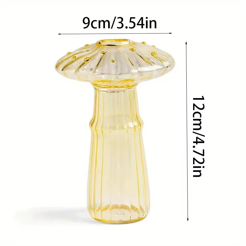 A translucent yellow glass mushroom vase with fluted top and vertical ridges for decorative hydroponic use