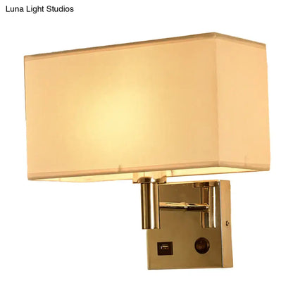 Contemporary wall lamp gold finish with beige fabric shade and integrated usb port for bedroom use