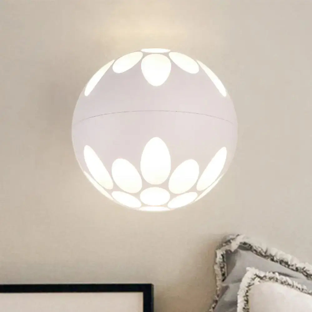 Contemporary black and gold spherical led wall lamp featuring a white lotus petal cutout wall light for bedroom