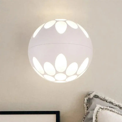 Contemporary black and gold spherical led wall lamp featuring a white lotus petal cutout wall light for bedroom