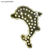 Contemporary black and white crystal prism dolphin wall light with glowing circular lights and clear crystal segments