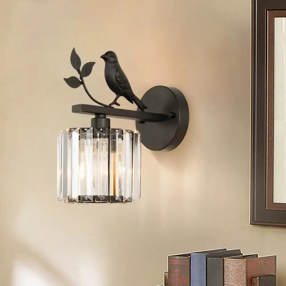 Contemporary black wrought iron wall lamp with a perched bird on leafy branch and e12 e14 crystal prism light type