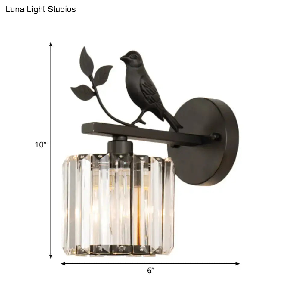 Contemporary black wrought iron wall lamp with perched bird leaf motif and crystal prisms for e12 e14 light type