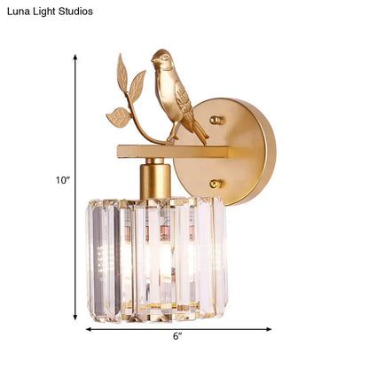 Contemporary black and gold wall lamp with gold-toned bird detail and cylindrical crystal shade for e12 e14 light type