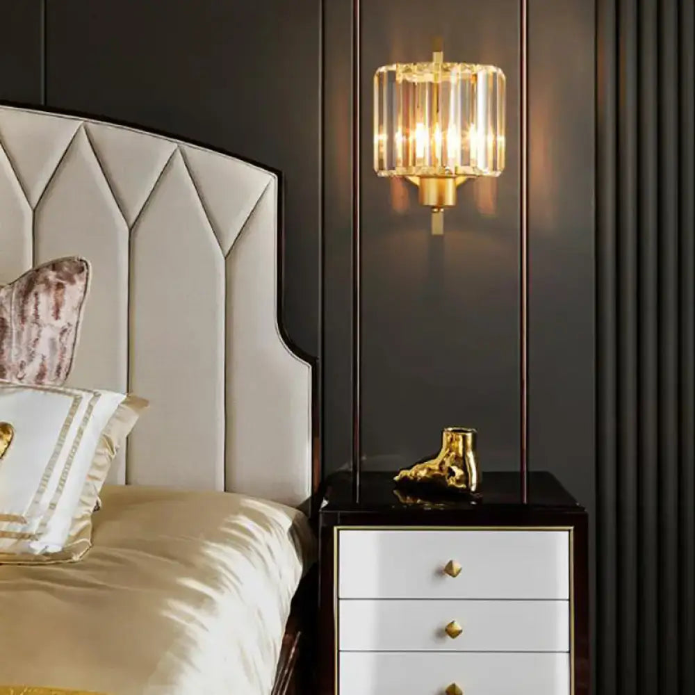Contemporary black and gold crystal drum wall lamp with gold-toned crystal prisms and warm glowing light for bedroom lighting e26 e27