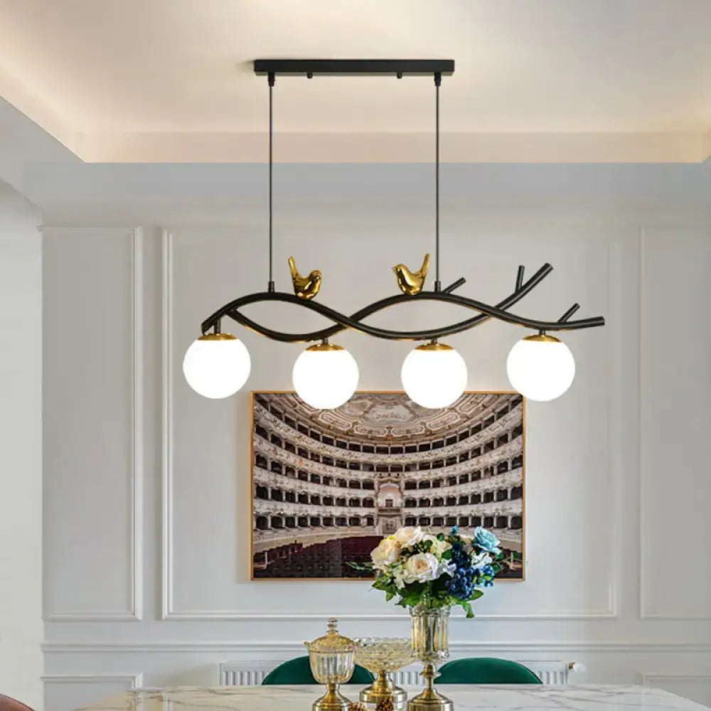 Decorbites contemporary black and gold linear branch dining pendant light with four cream glass bulbs for dining room island