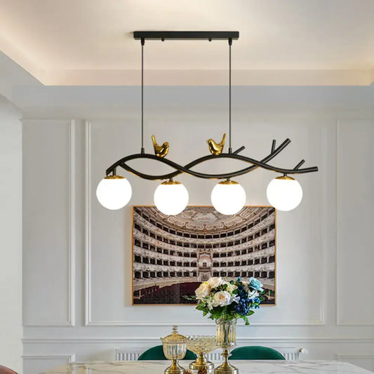 Decorbites contemporary black and gold linear branch dining pendant light with four cream glass bulbs for dining room island