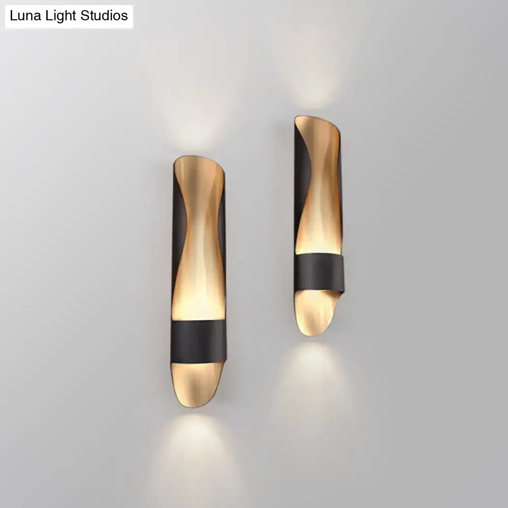 Contemporary black and gold twisted led wall sconce with modern sleek curved design for bedroom lighting
