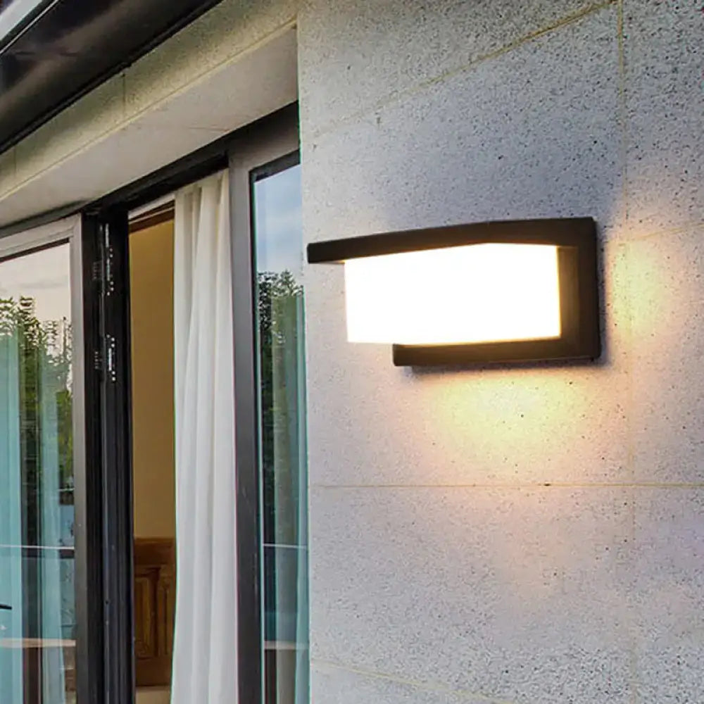 Contemporary black led wall lamp with minimalist rectangular design and warm white outdoor illumination