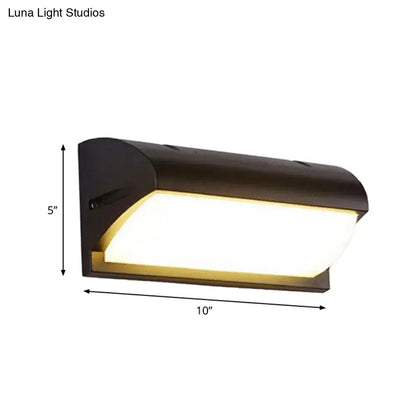 Contemporary black led wall lamp with sleek curved design and warm white illumination for outdoor use