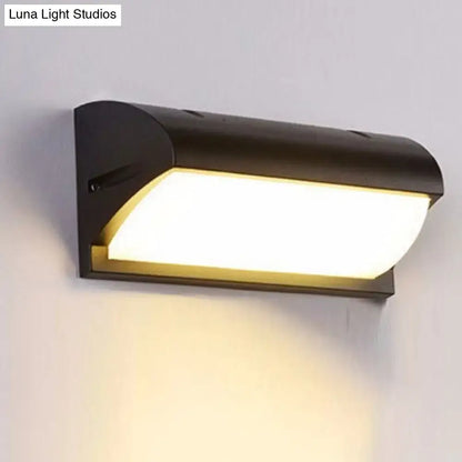 Contemporary black led wall lamp with sleek curved design and warm white light for outdoor courtyard use