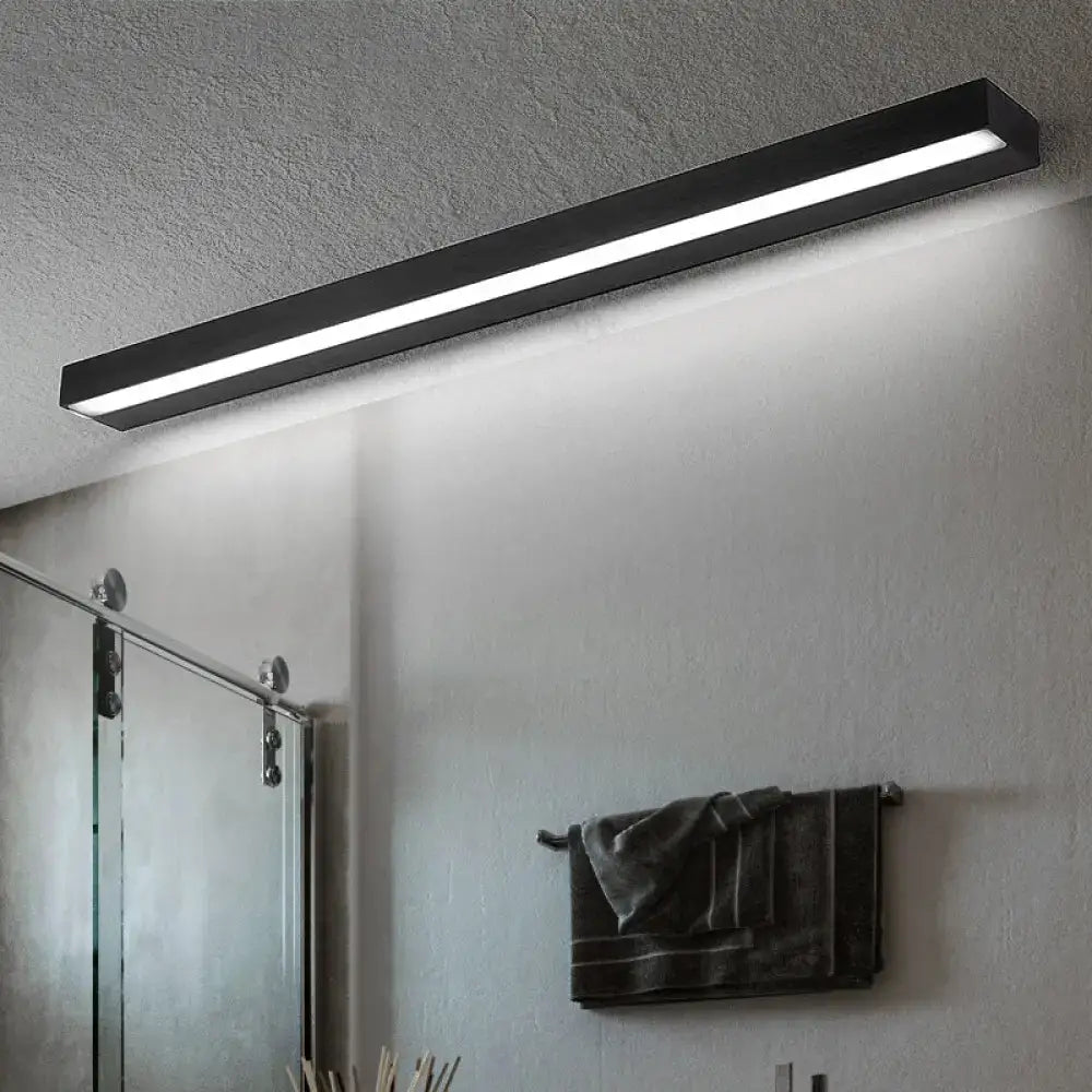 Contemporary black and silver linear vanity sconce with white warm LED light for modern bathroom mirror lighting