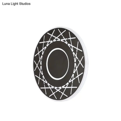 Contemporary black white geometric wall lamp coaster with intersecting lines and inner oval for living room decor